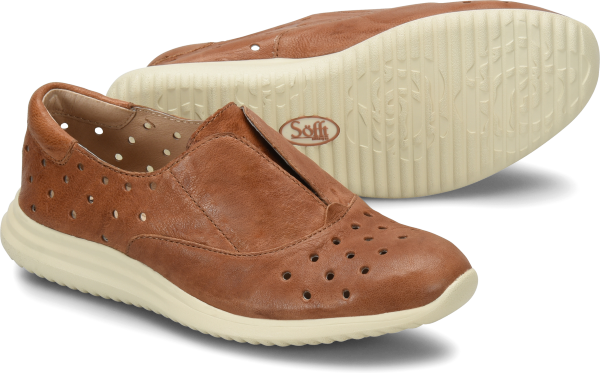 A fresh slip-on in premium Italian leather with a sport silhouette. Perforated to keep you cool.   Offered in Italian full-grain leather  Leather lining  Molded contoured foam footbed with soft microfiber lining  Soft PU outsole for ultra flexibility  Heel Height: 1 1/2 inches