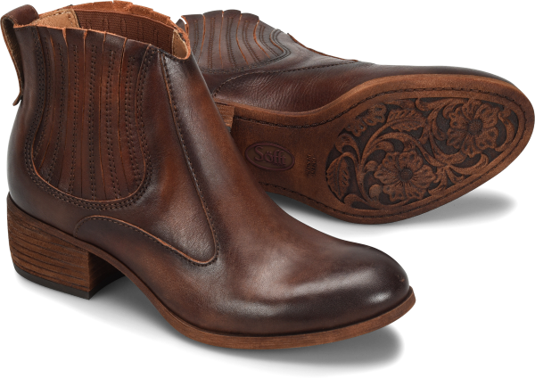 A beautifully hand-burnished Italian leather boot crafted with gorgeous details.   Offered in full-grain Italian leather  Hidden stretch goring for flexibility  Heel tab  Microfiber lining  Leather lined footbed, cushioned for comfort  Stacked heel  Lightweight TPR outsole  Heel Height: 1 1/2 inches